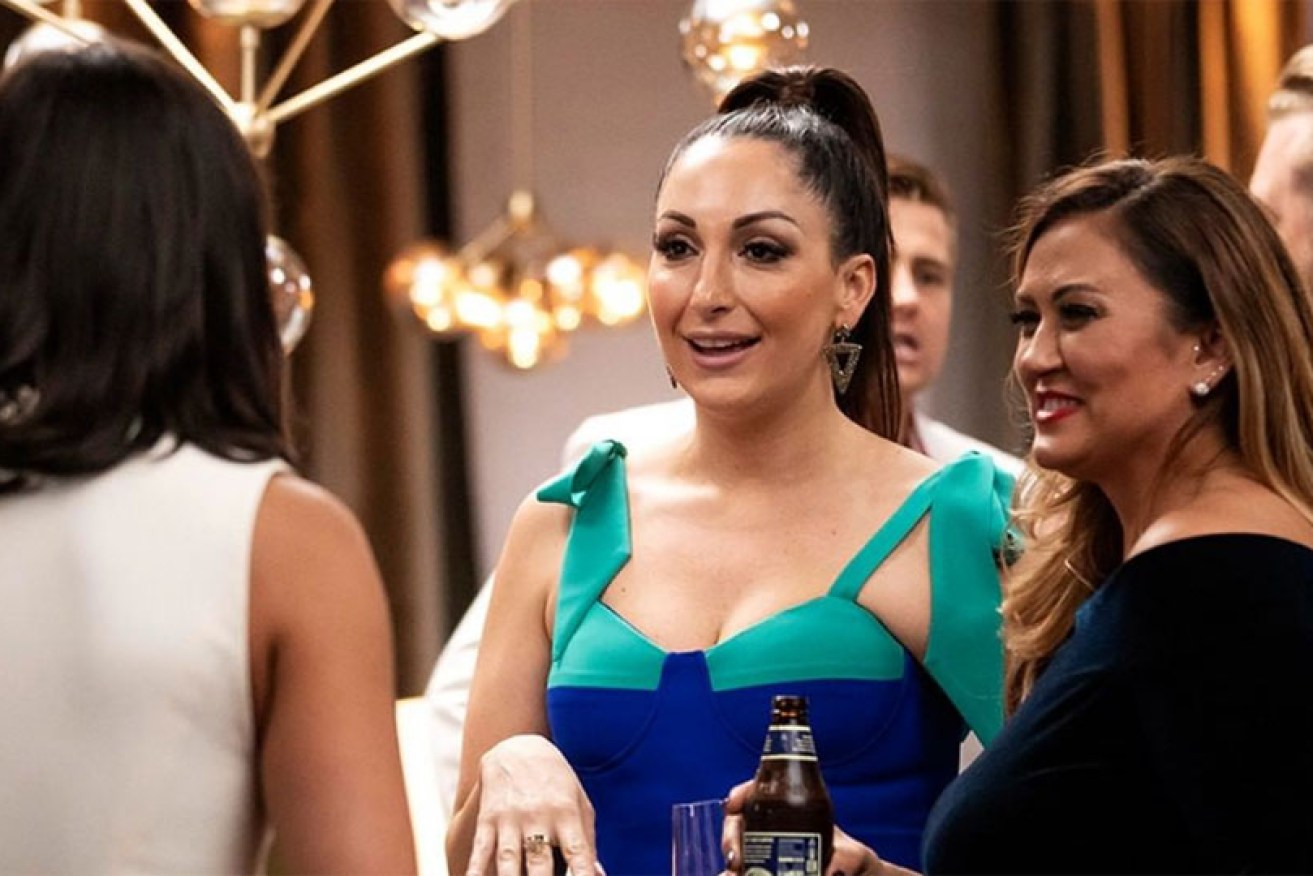 Poppy (centre) with fellow <i>Married at First Sight</i> brides before her abrupt exit from the Nine hit.