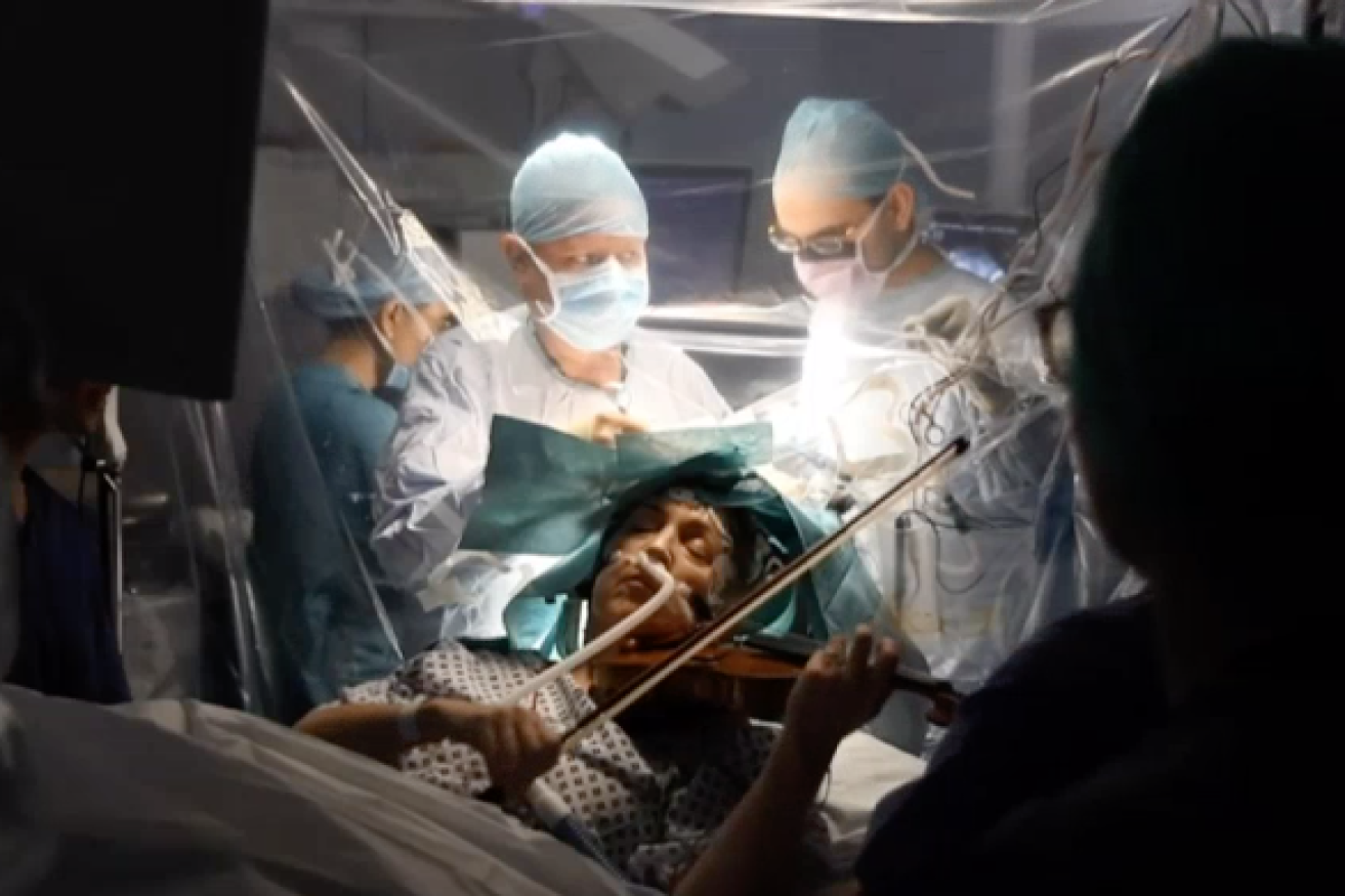 Dagmar Turner, 53, played the violin during brain surgery to ensure she did not lose function of her hands.