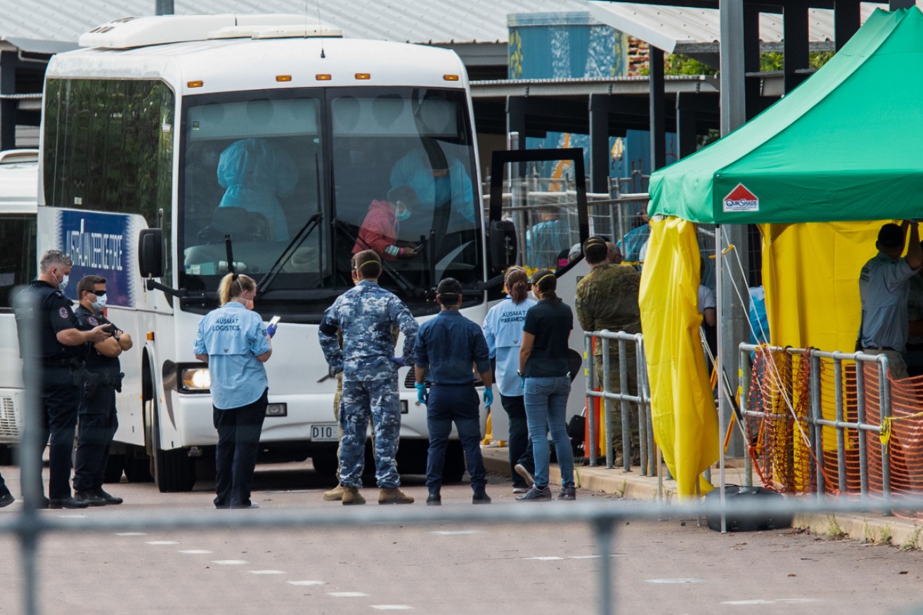 Australian evacuees from the Diamond Princess cruise ship arrive in Darwin on Thursday.