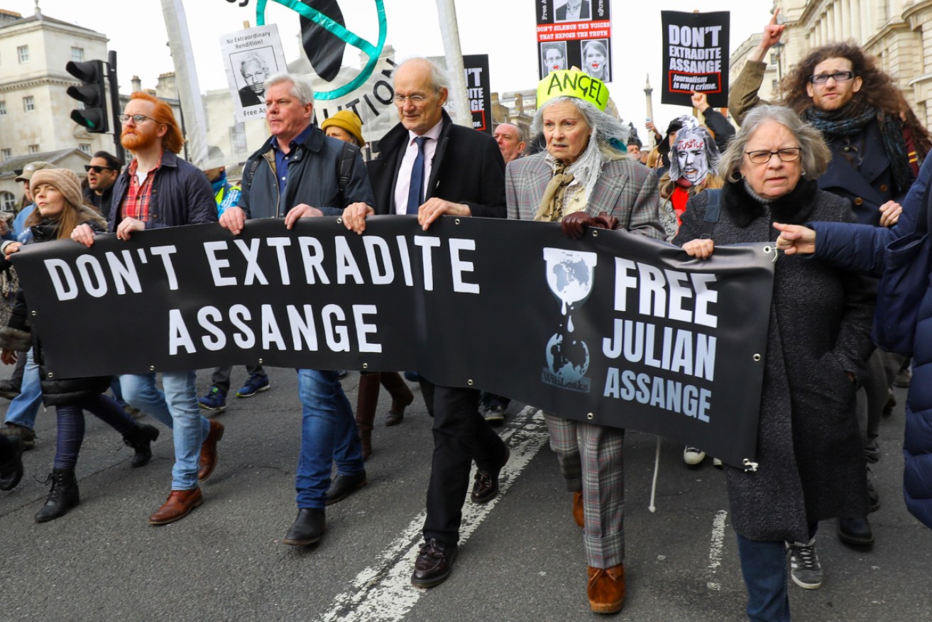 Hundreds gathered in London to show their support for Julian Assange ahead of his hearing on Monday.