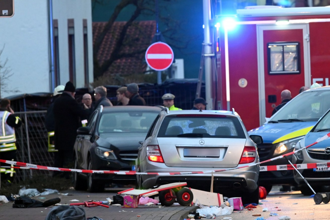 View of the car (M) that went into a Rose Monday procession, seriously injuring several children.