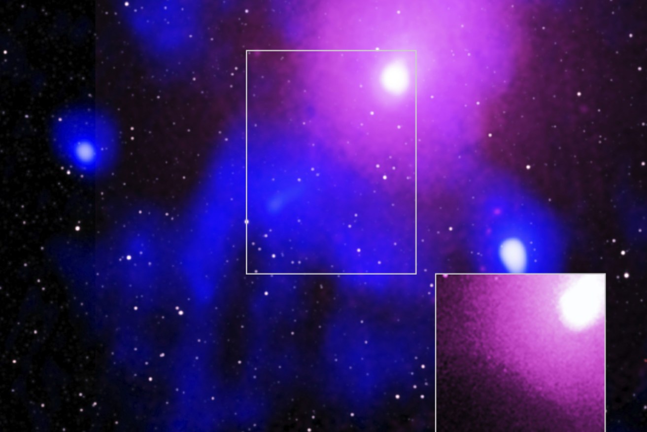 An explosion in the Ophiuchus cluster of galaxies (pictured) was so large it carved out a crater in the hot gas that could hold 15 Milky Ways.