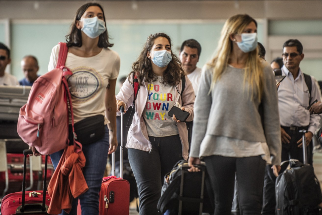 Return travellers were transported directly to hotels across Melbourne where they were quarantined for 14 days before being released.