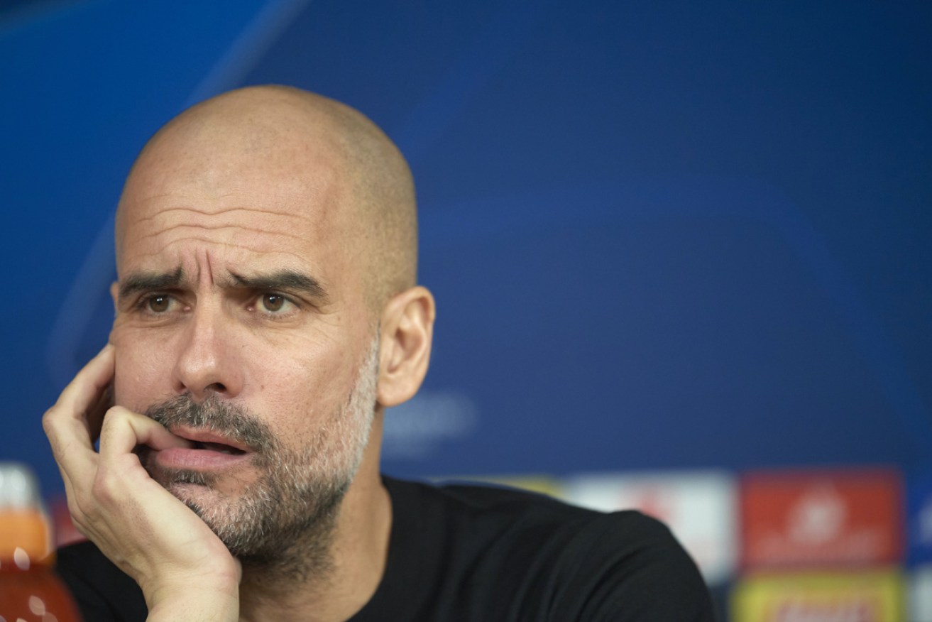Manchester City coach Pep Guardiola fronts the media in Madrid on Tuesday.  