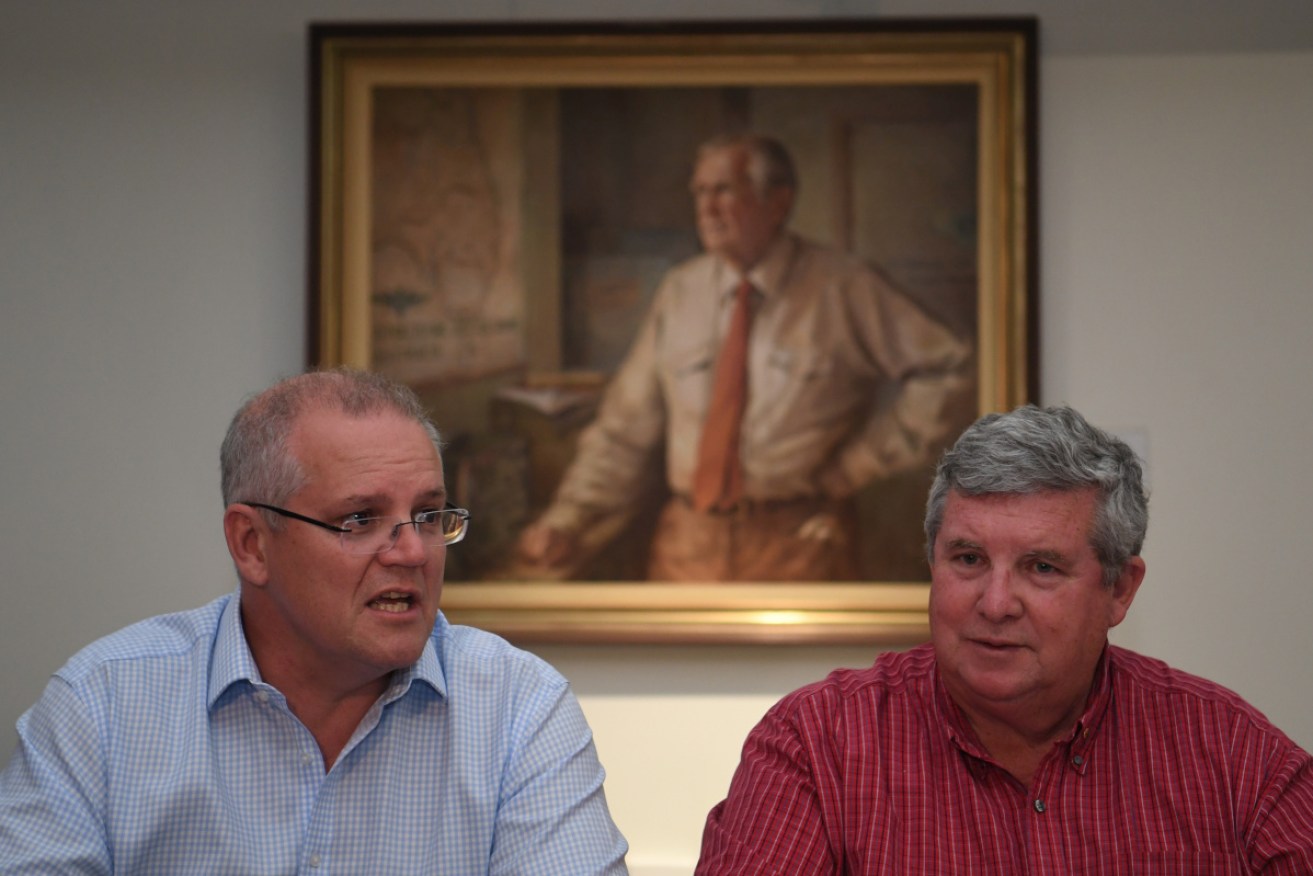 Prime Minister Scott Morrison with Order of Australia Council chair Shane Stone at Cloncurry in  May.