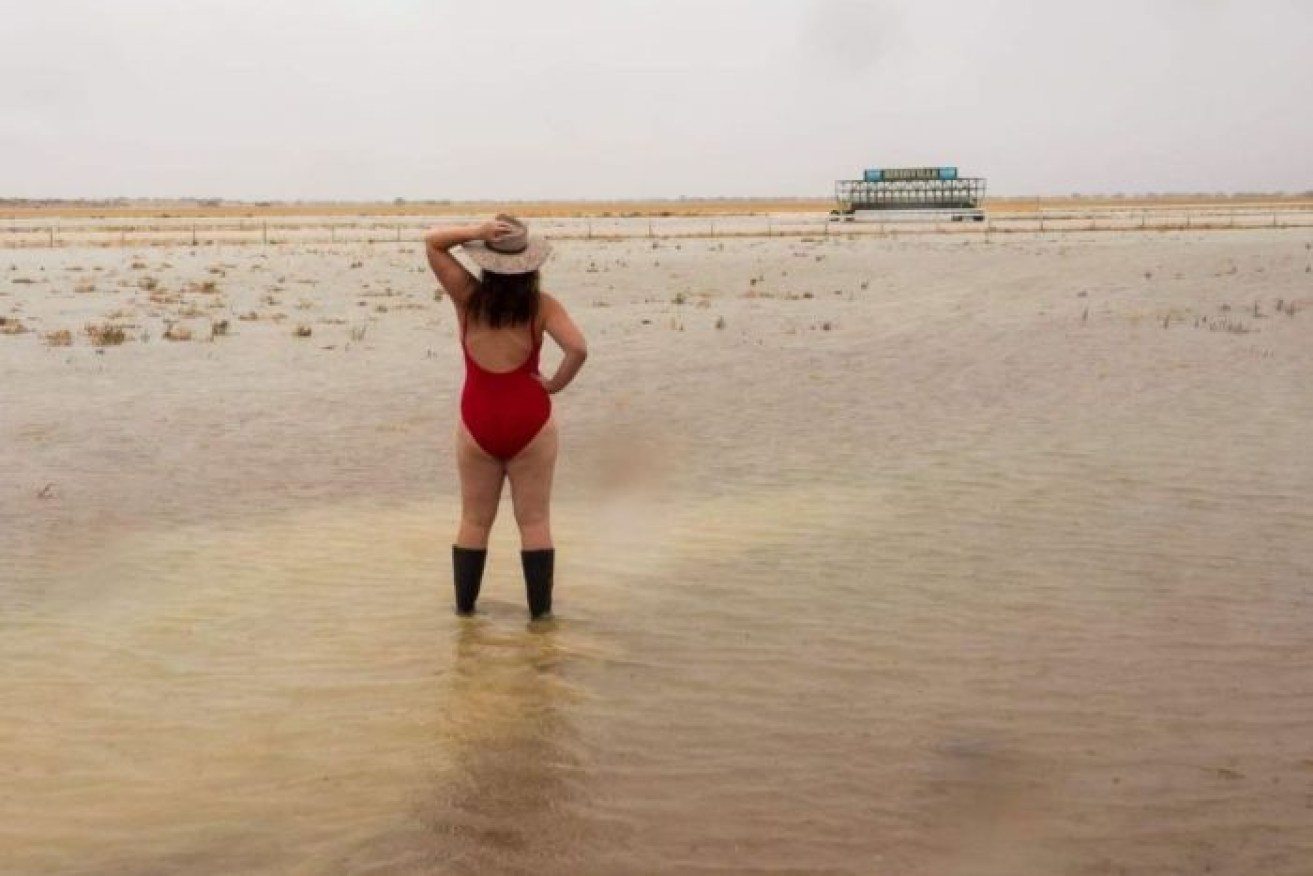 The unlikely chill in Birdsville didn't stop locals celebrating the welcome rain.