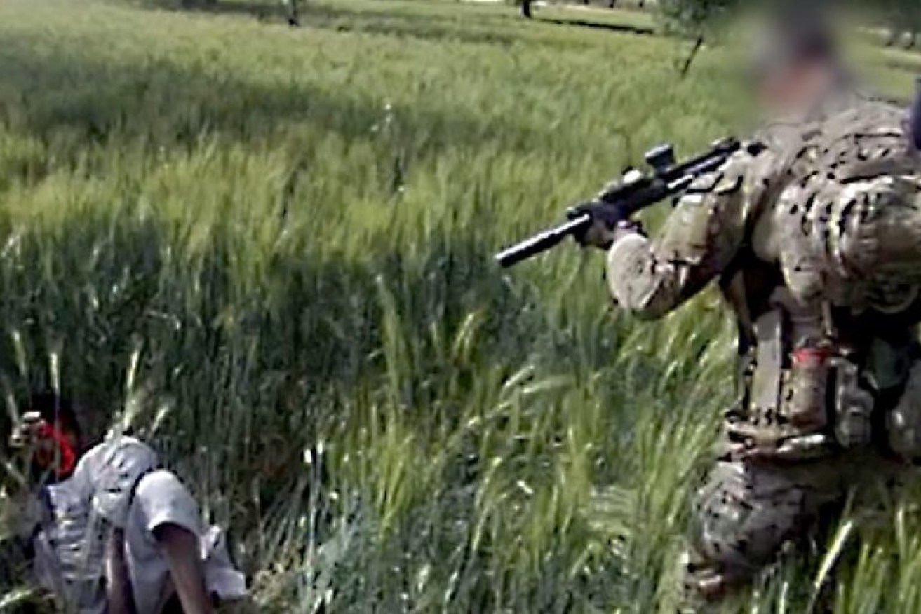 A snippet of video footage showing a SAS soldier killing an unarmed Afghani.
