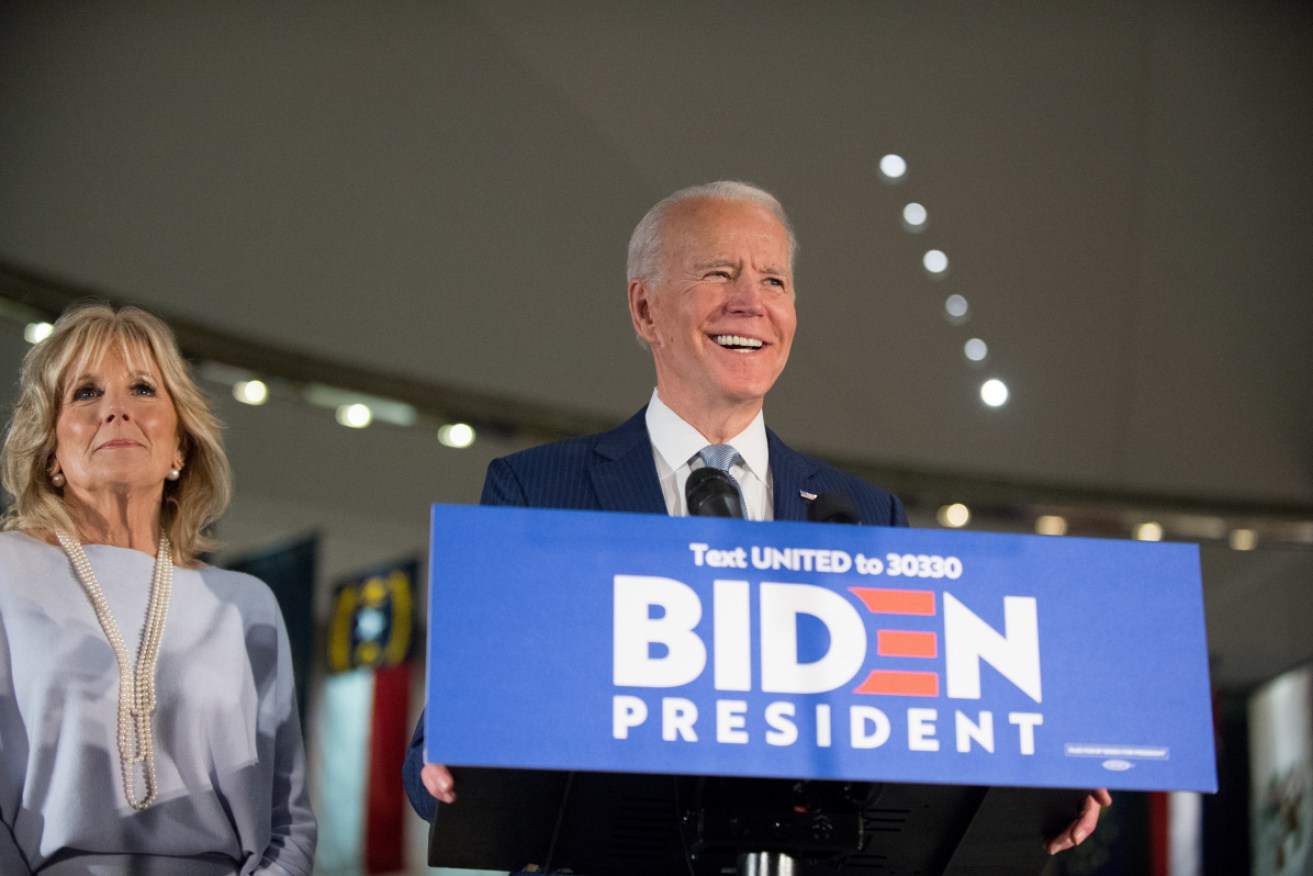 Democratic Party presidential candidate Joe Biden (R), accompanied by his wife Jill Biden (L), speaks at a primary night event in Pennsylvania.
