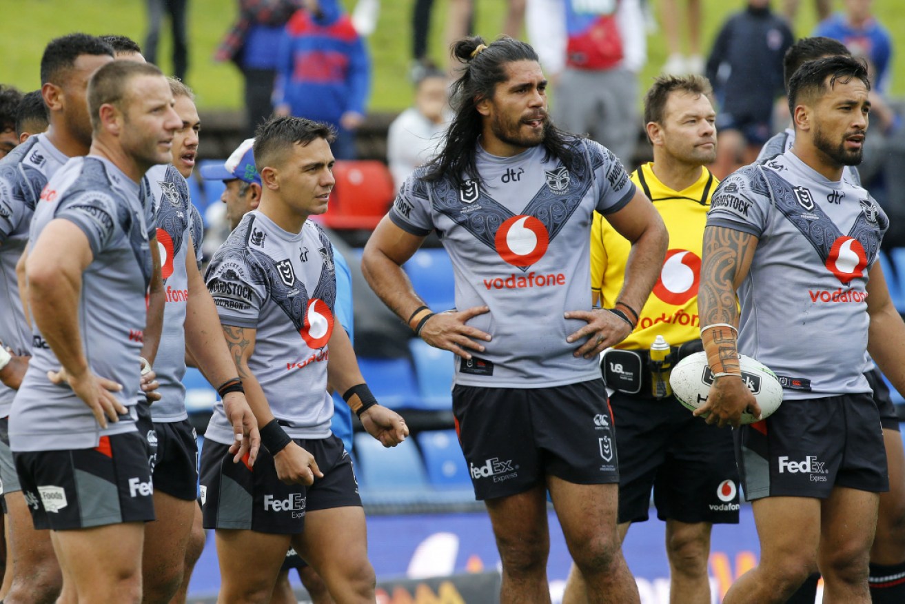 Tough times: Warriors players after their 20-0 first-round loss against the Newcastle Knights. 