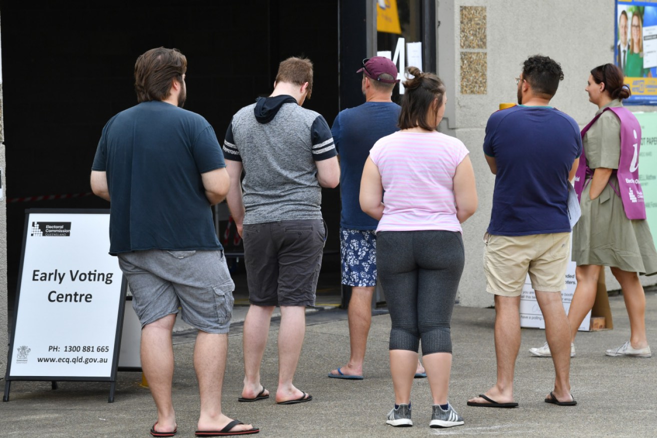 Voters queue at a pre-polling station in Brisbane.