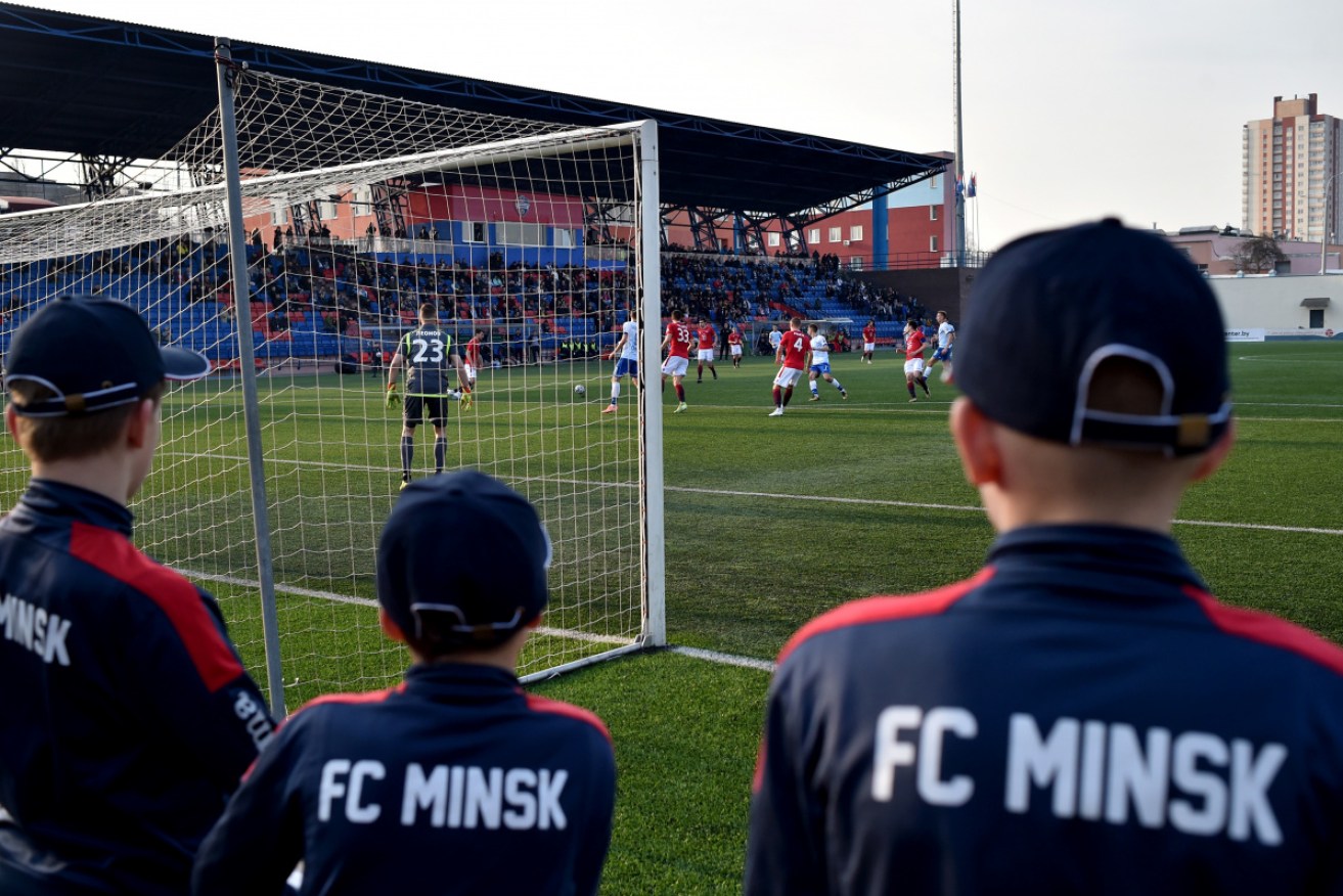 Fans at a Belarus league game between Minsk and Dinamo Minsk.