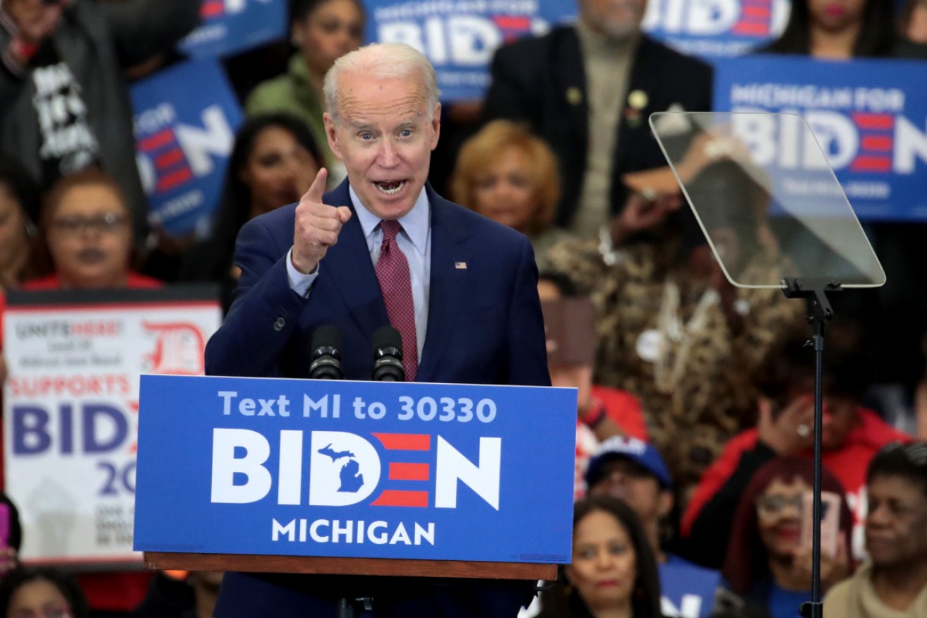 Democratic presidential candidate Joe Biden address the crowd at a rally in Michigan.