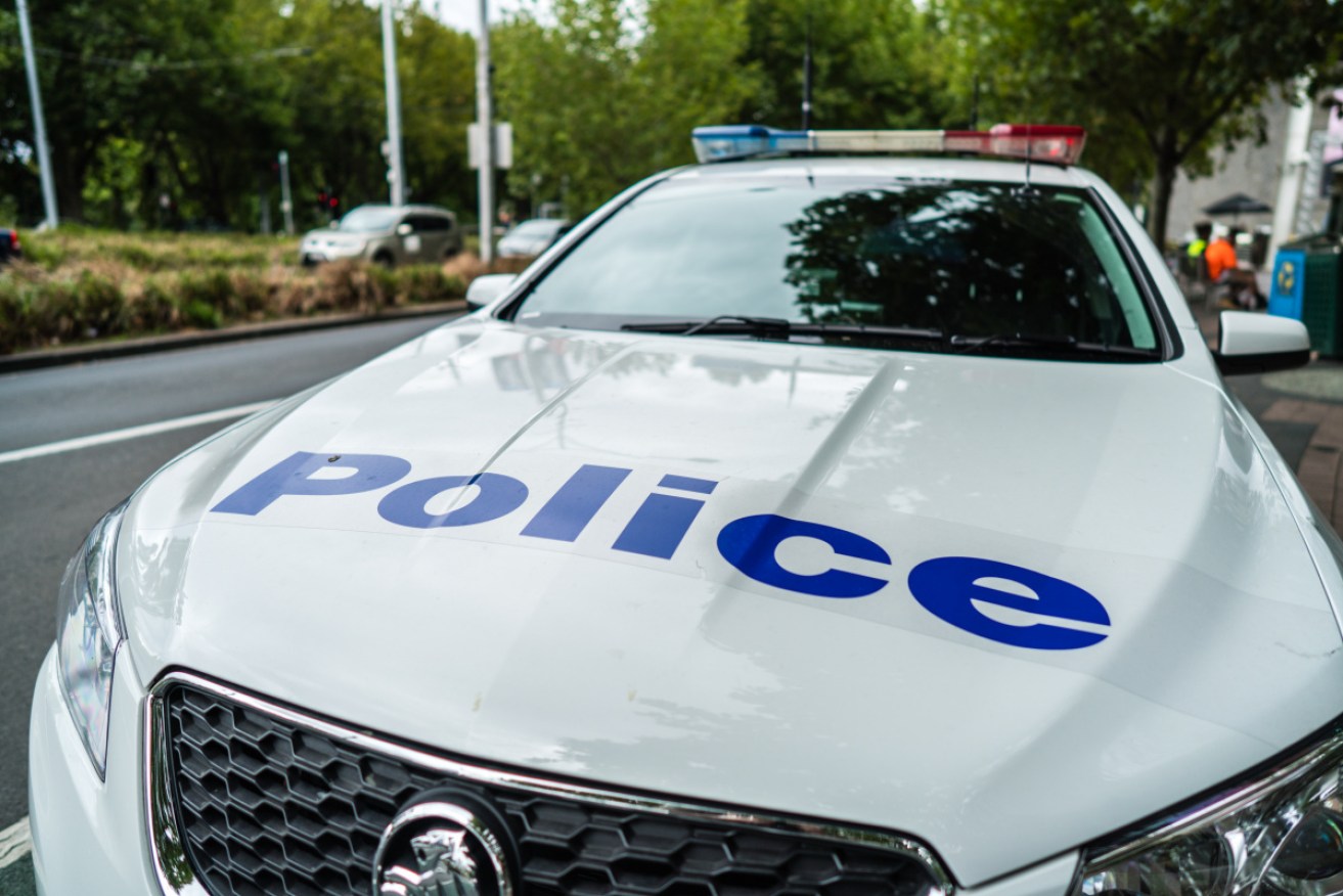 One man who was chased by police had to be taken to hospital after an officer was forced to discharge his gun.