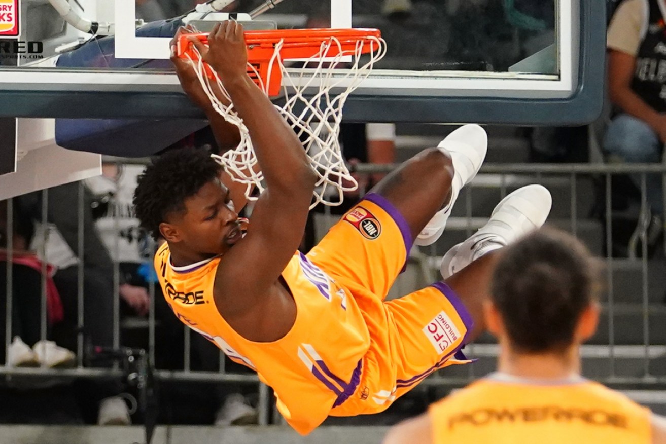 Sydney's Jae'Sean Tate dunks in a rare highlight for the Kings in Monday's NBL second semi-final in Melbourne.