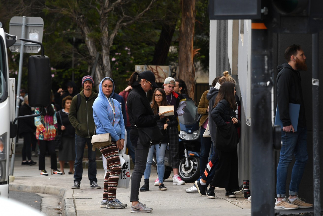 Scenes such as this outside Centrelink offices were common in late March and early April.