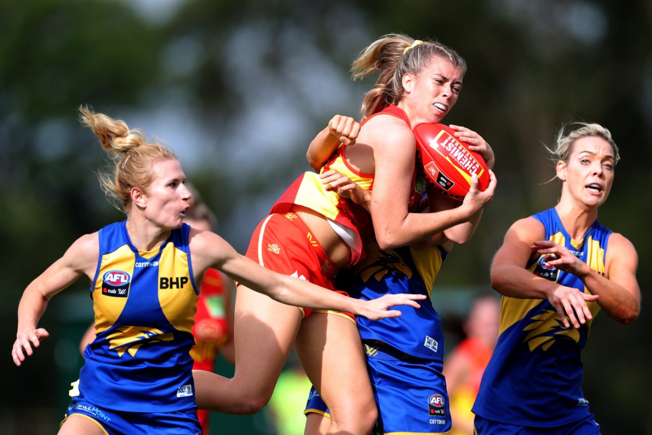 Gold Coast's Kalinda Howarth marks against West Coast as news emerges that the AFLW season will go straight to finals. Photo: AAP