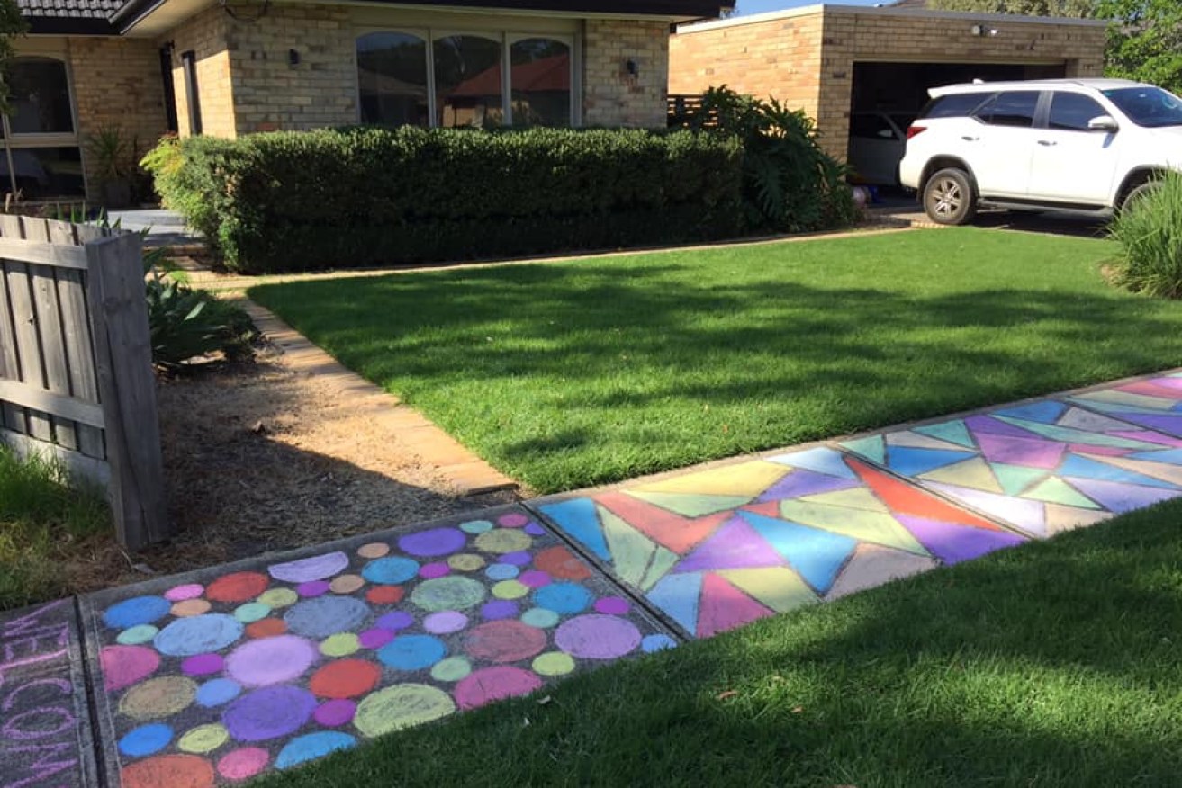 Lisa Hammond and her children found a way to pass the time  – and brighten the community – while staying home. 