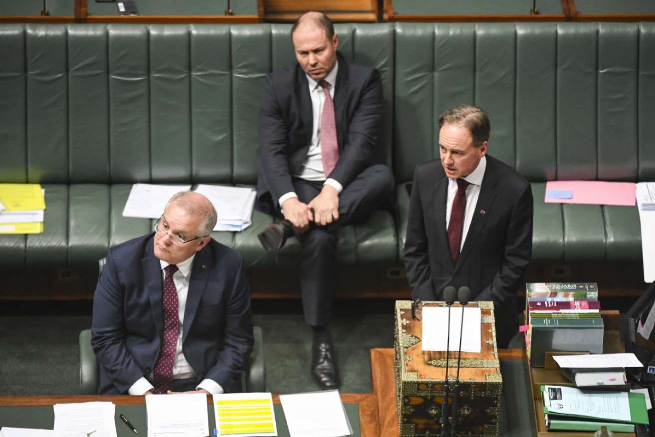 PM Scott Morrison, Treasurer Josh Frydenberg and Health Minister Greg Hunt. Photo: AAP