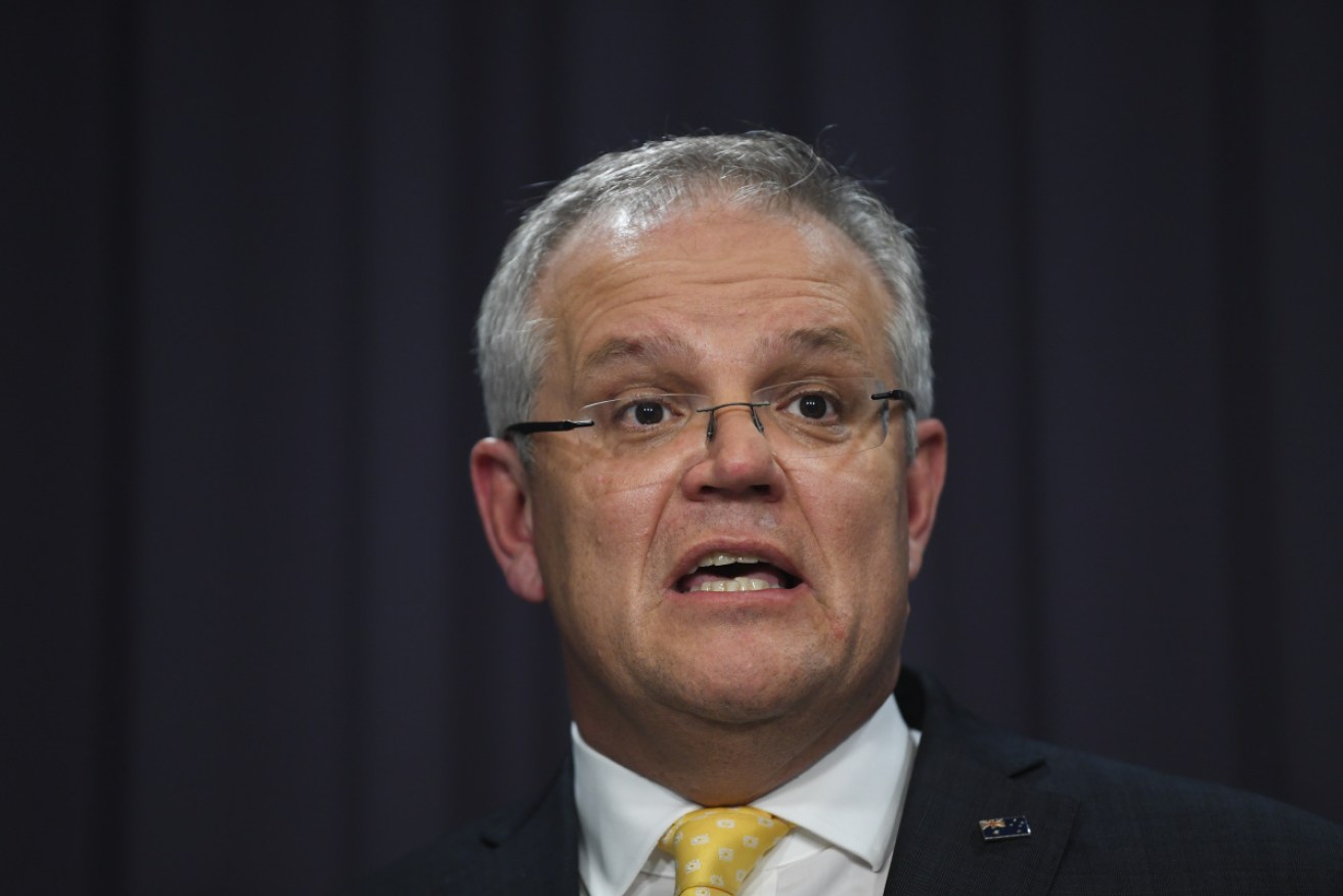 Prime Minister Scott Morrison announces the latest pandemic measures on Tuesday night.