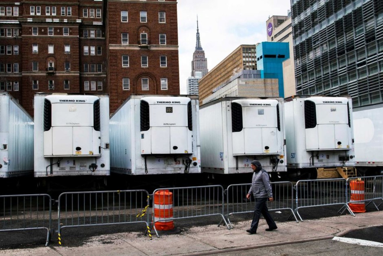 Refrigerated trucks have been turned into makeshift morgues in the USA to deal with the rising number of deaths.