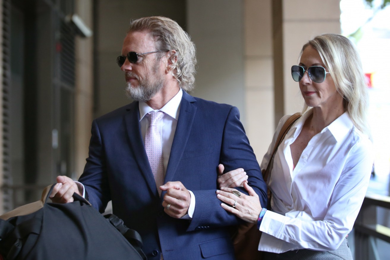 Australian actor Craig McLachlan with partner Vanessa Scammell outside  Melbourne Magistrates Court on March 11.