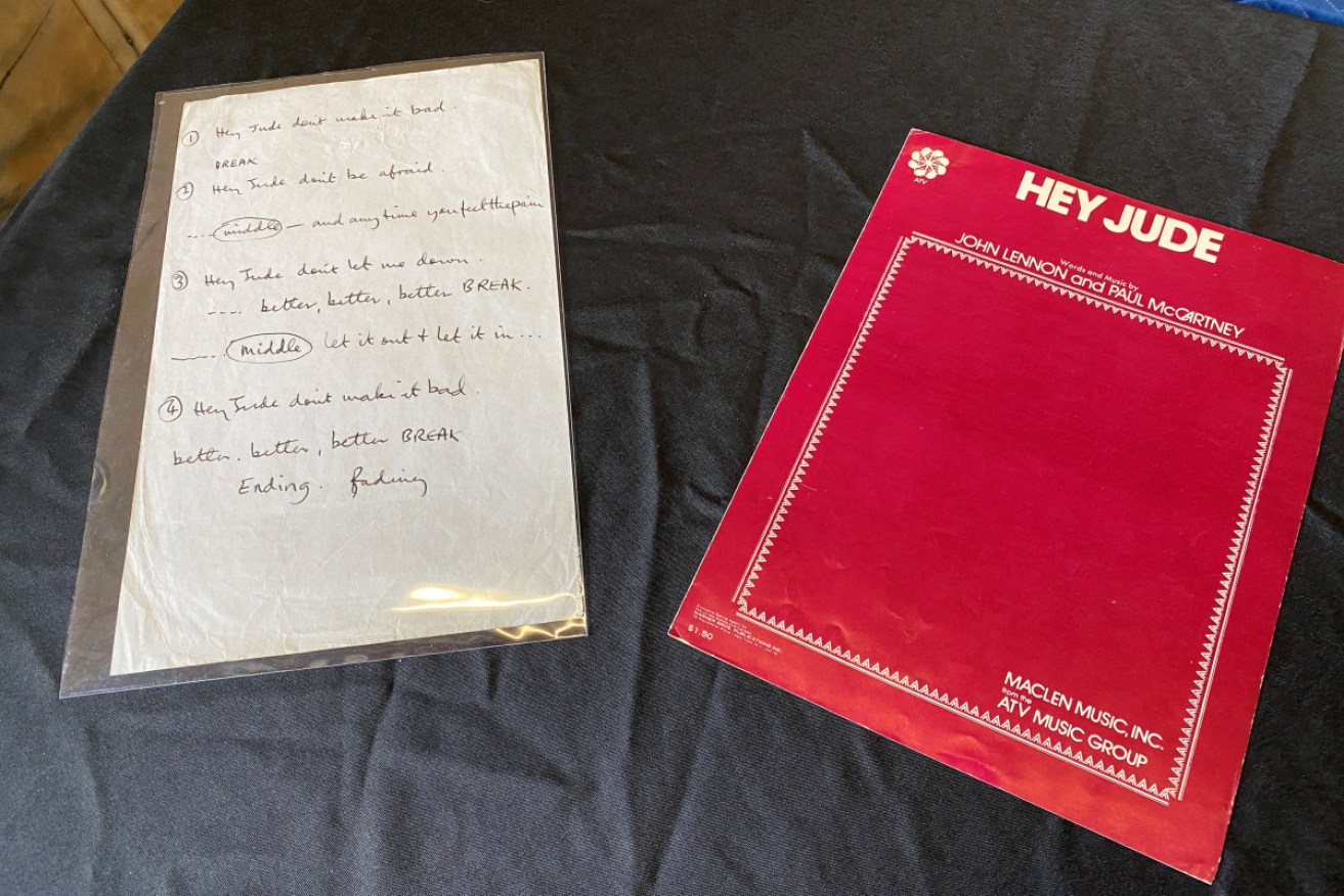 Handwritten lyrics to Beatles hit Hey Jude by Sir Paul McCartney have sold for a huge sum at an auction marking 50 years since the band split.