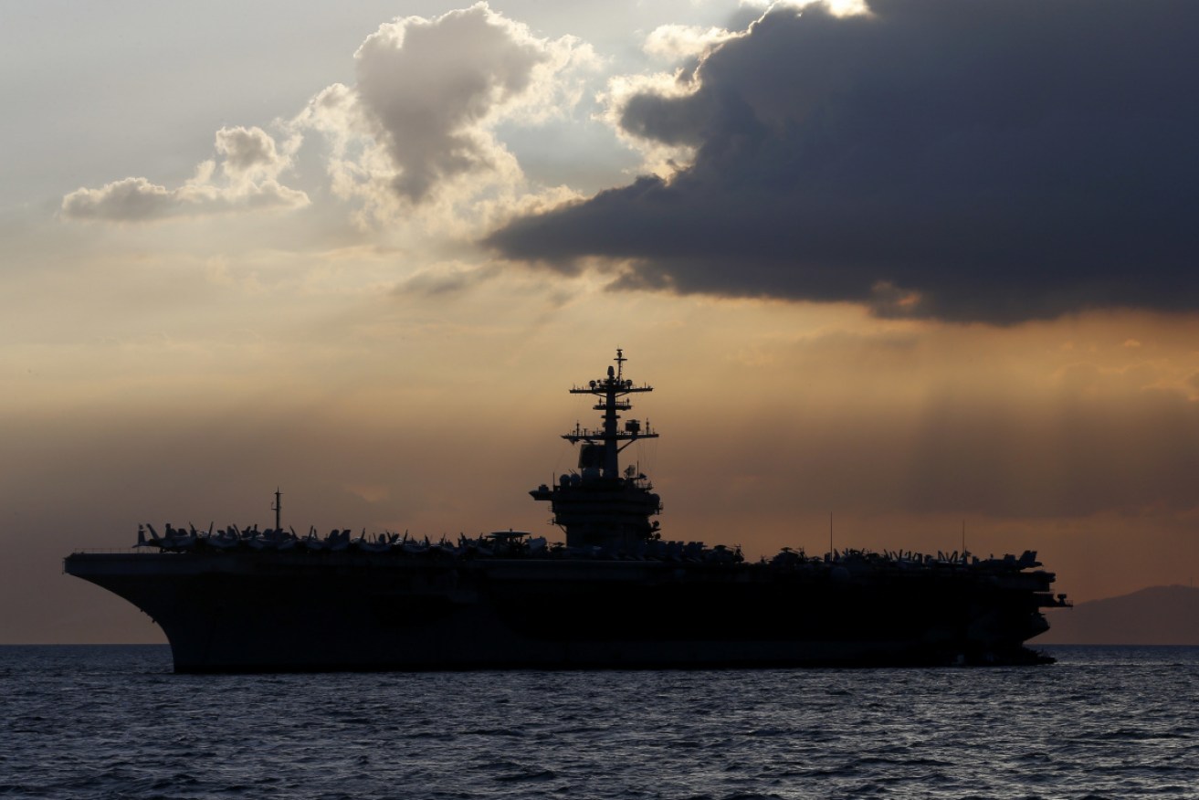 Outbreak: The USS Theodore Roosevelt is in Guam.