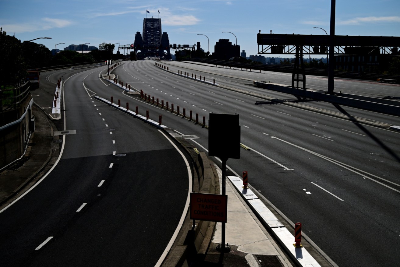 An empty freeway on the approach to Sydney Harbour Bridge on Monday afternoon.