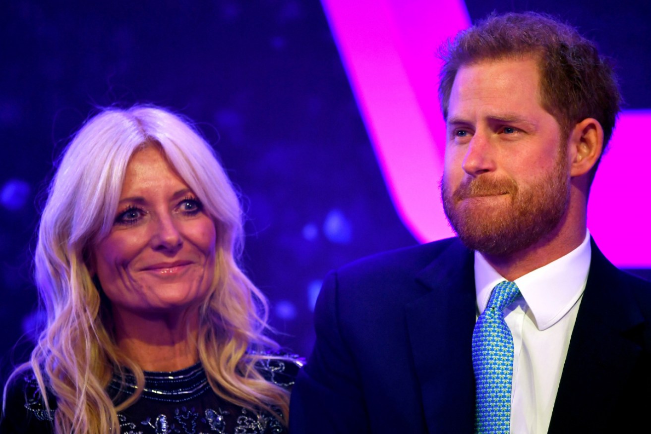 Prince Harry with British TV presenter Gaby Roslin at the 2019 WellChild Awards in London.