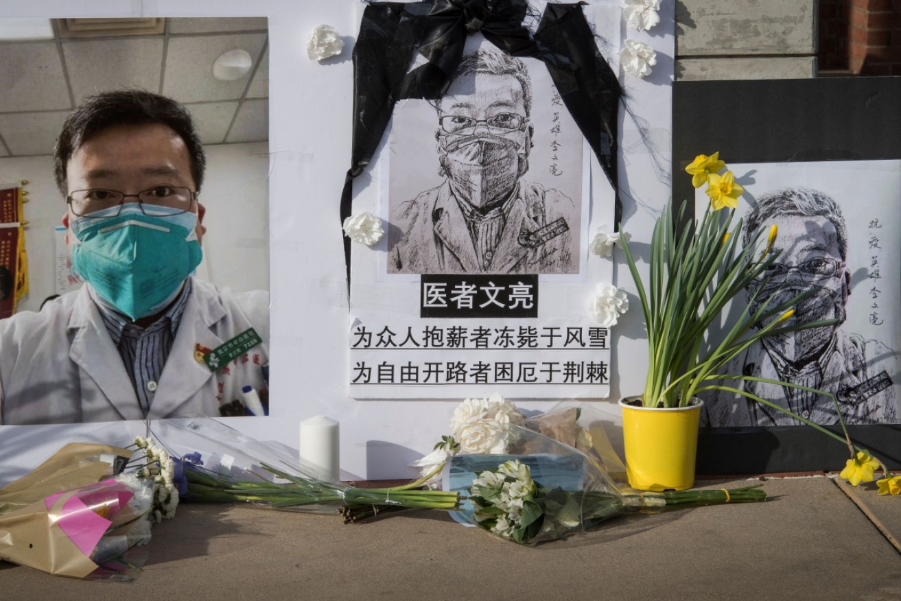 Chinese students and supporters hold a memorial for Dr Li Wenliang, the whistleblower of the coronavirus, COVID-19.