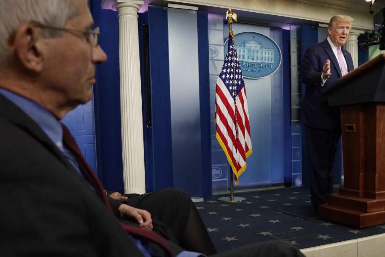 Anthony Fauci and Donald Trump at a White House coronavirus briefing.