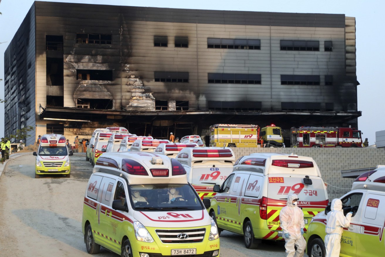 Emergency services at the scene after a fire engulfed a construction site for a distribution warehouse at Icheon, South Korea