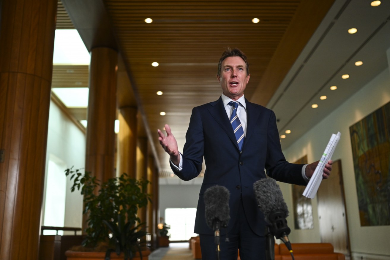 Attorney-General Christian Porter details the temporary JobKeeper provisions in Canberra on Tuesday.  
