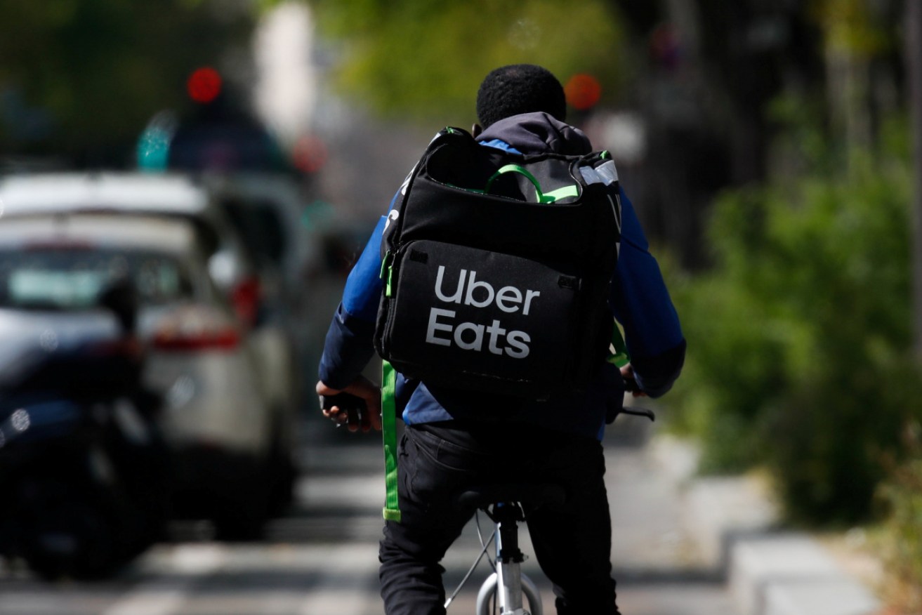Gig economy workers have long been largely unregulated when it comes to pay. Photo: AAP
