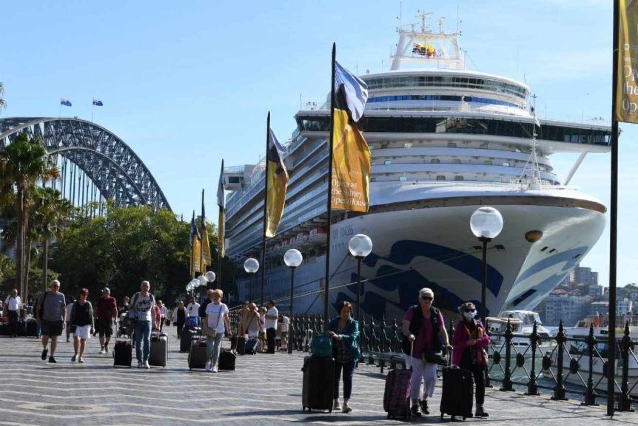 Passengers on Circular Quay after leaving the Ruby Princess in March.