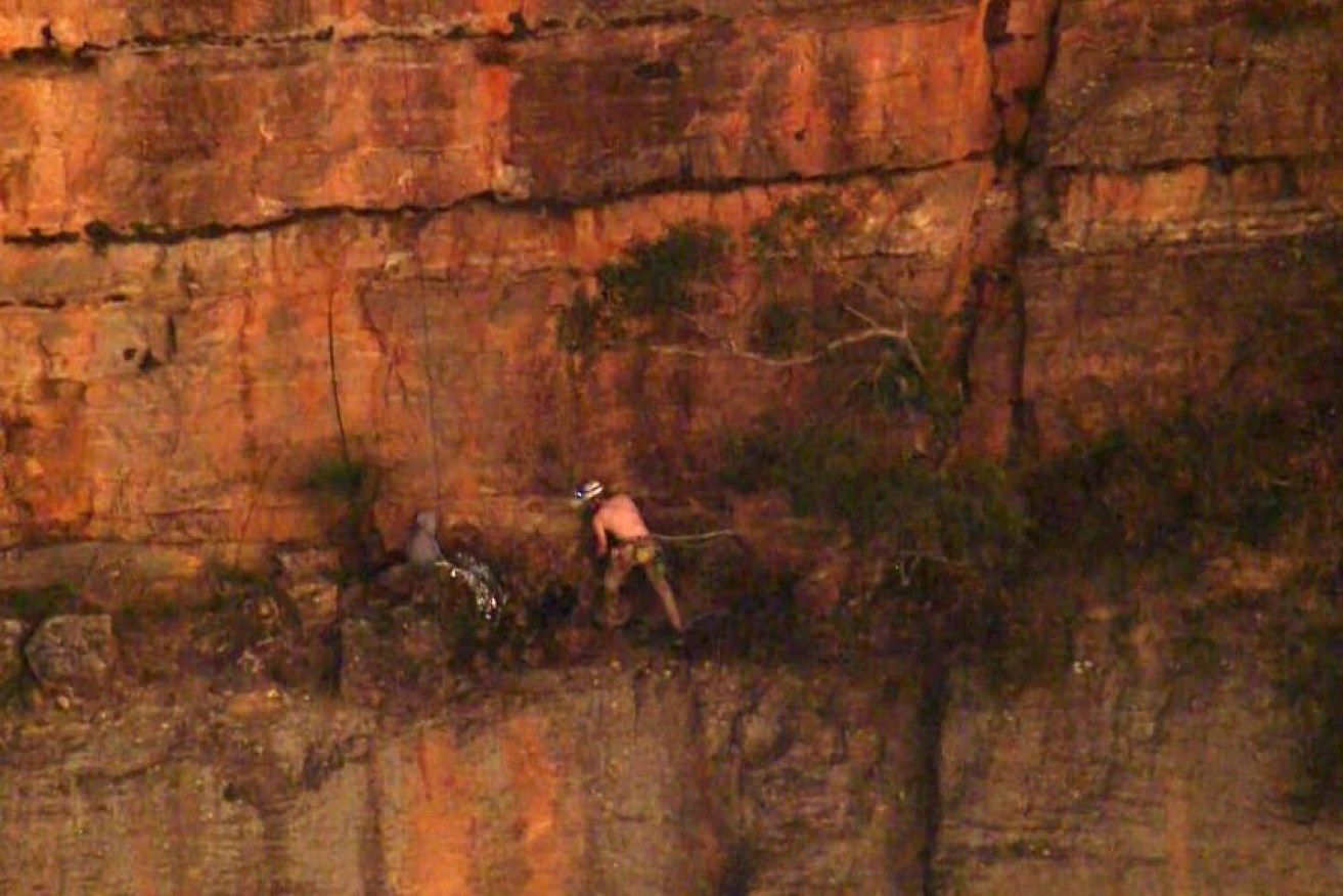 The injured climber spent the night on the narrow ledge high in the Blue Mountains.