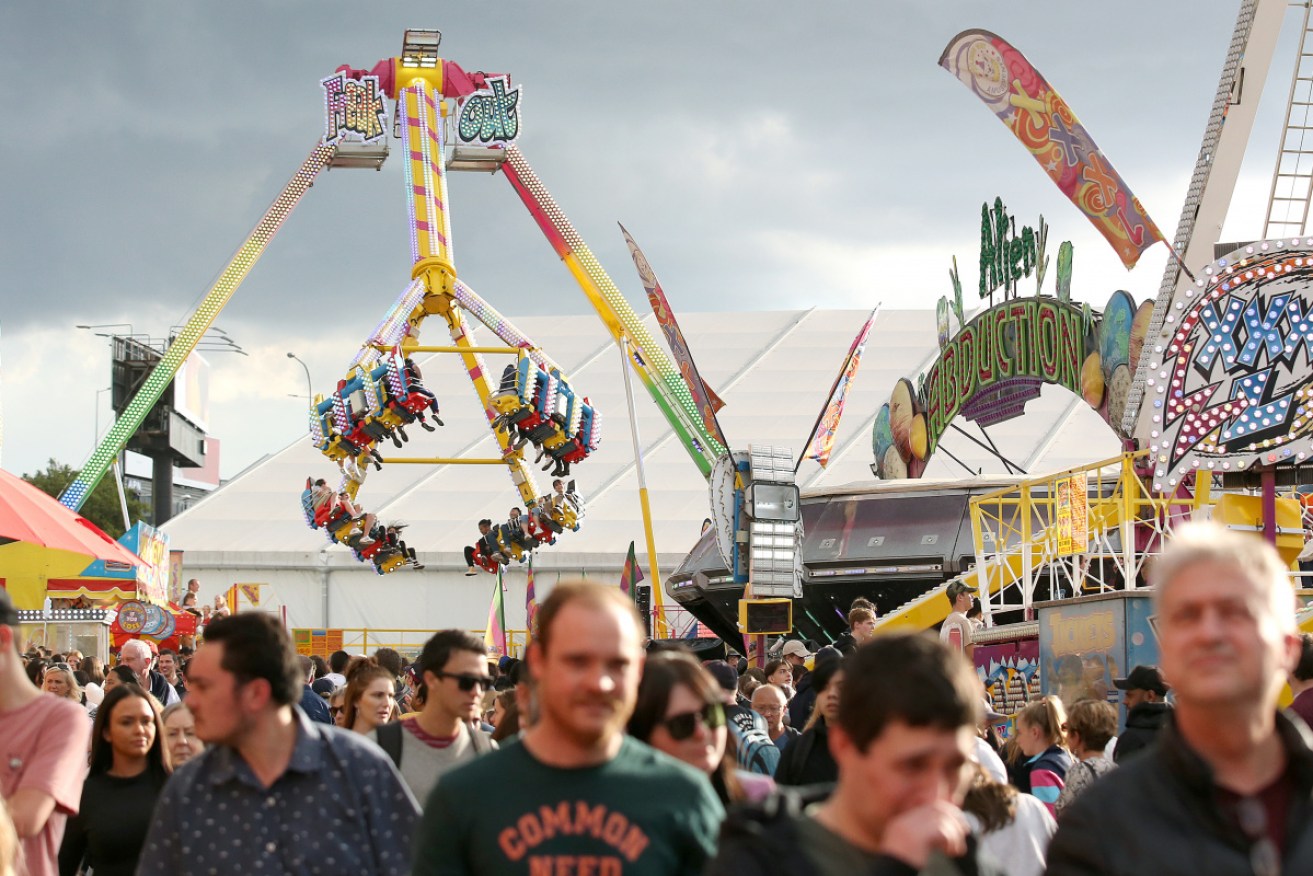A One Nation staffer was allegedly set upon by four people at the Royal Queensland Show.