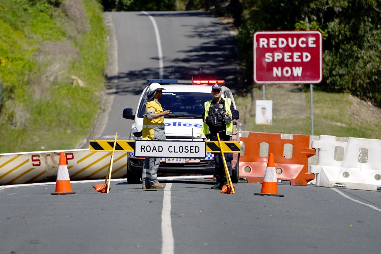No more internal police checkpoints for Queensland, but out-of-staters will still be stopped at the borders.