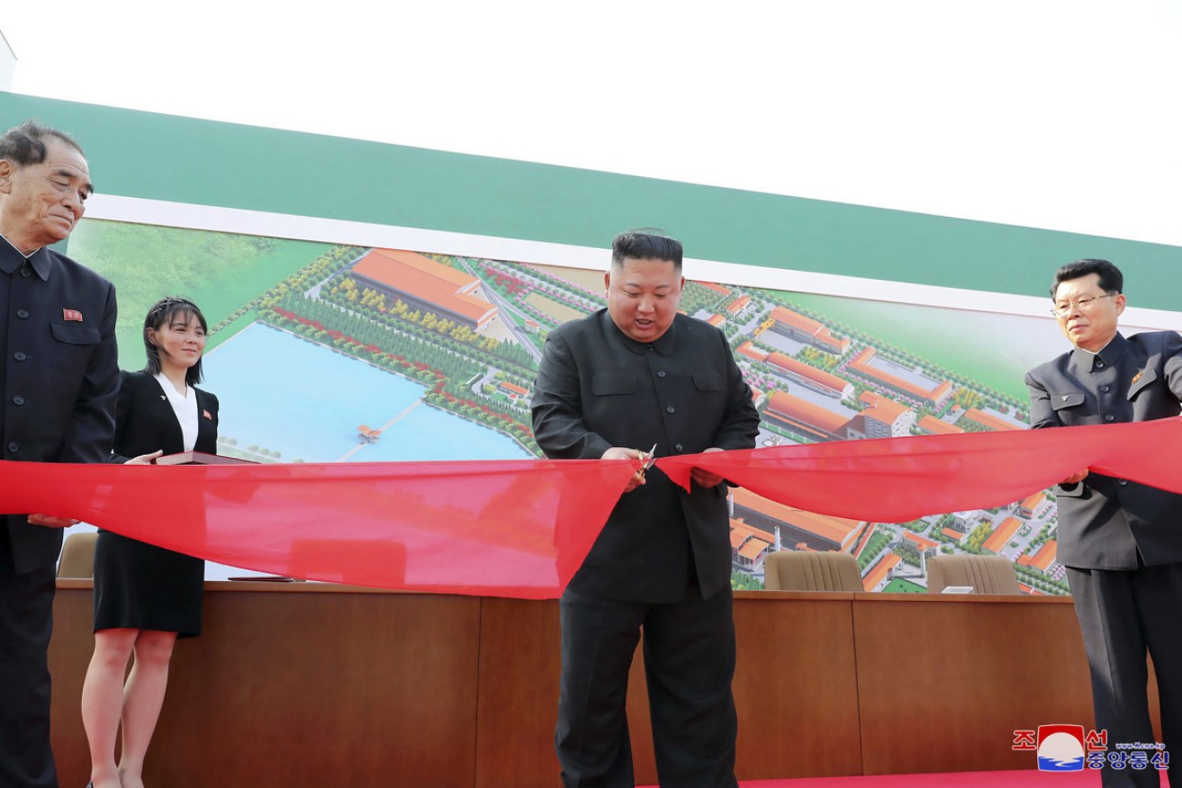 State media issued this picture said to show Kim Jong-un opening a fertiliser plant on Friday.