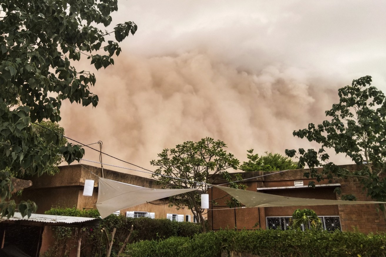 The dust cloud looms over Niamey on May 4.