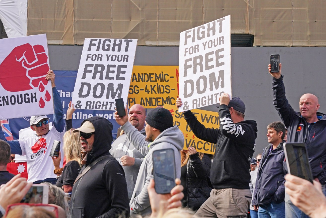 Anti-lockdown protesters outside the Victorian parliament on Sunday.