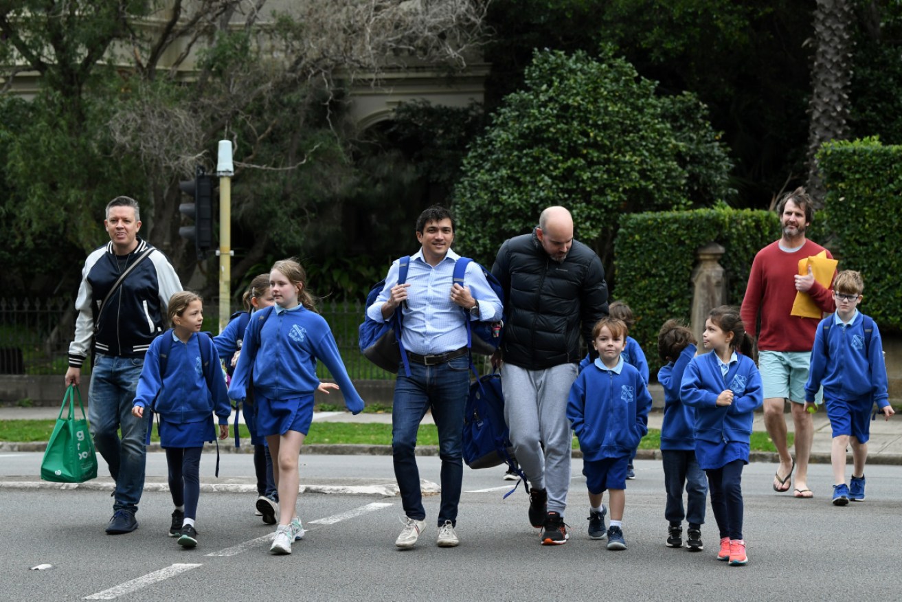 Parents and students arrive for the return of classes at Annandale Public School in Sydney.