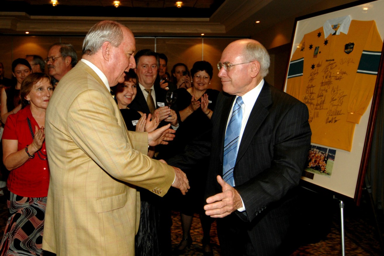 Alan Jones presses the flesh with admirer and supporter John Howard.