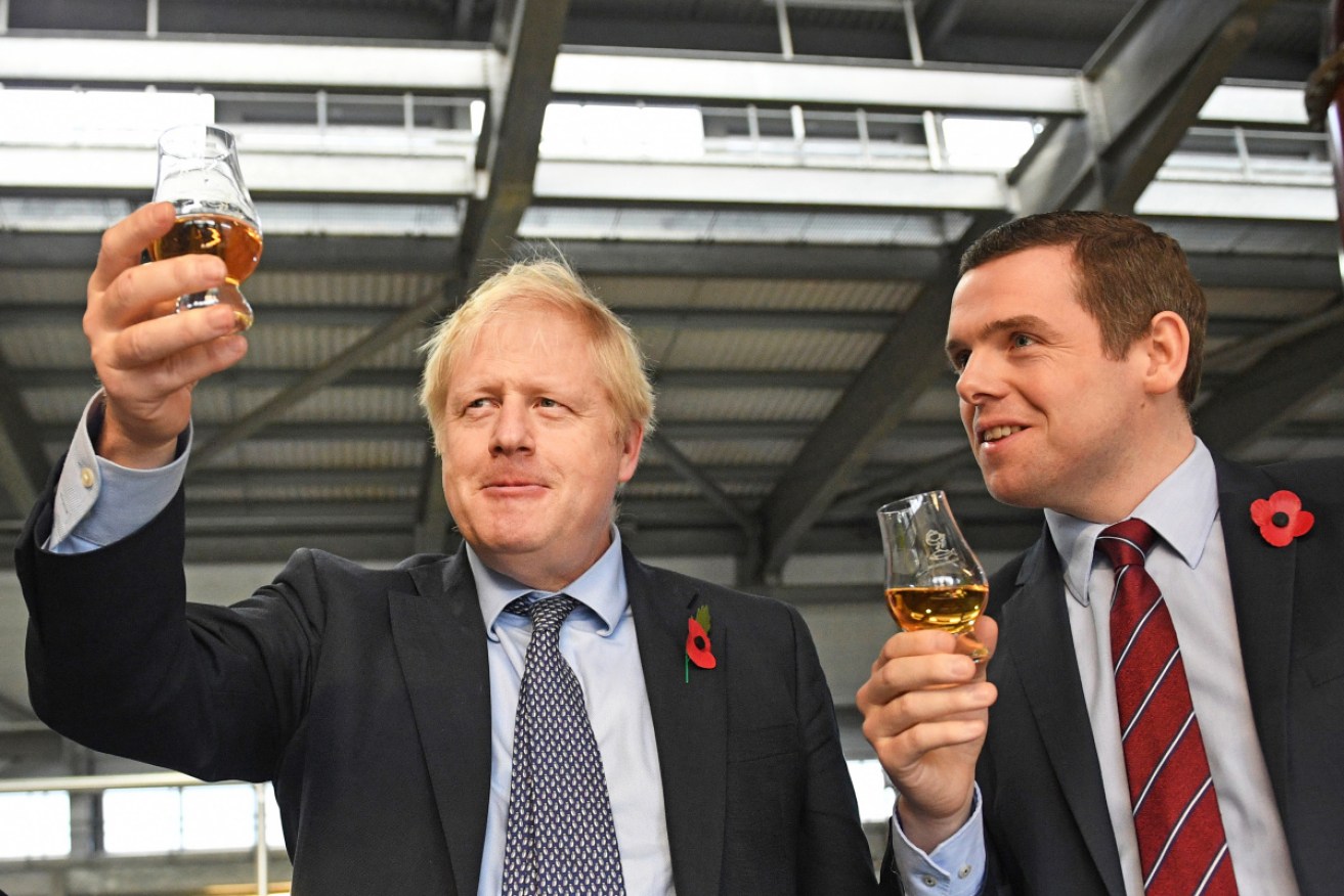 Boris Johnson in November with Douglas Ross, who has resigned over Dominic Cummings' alleged breach of lockdown rules.