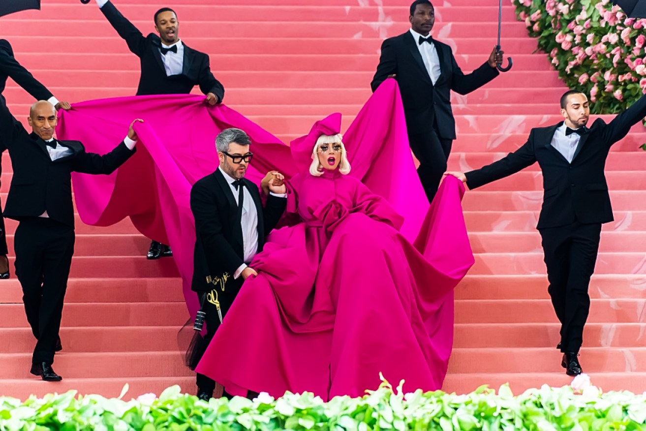 Lady Gaga's 2019 look was recreated for the Met Gala Challenge using bed sheets, a laundry basket and a bum bag.