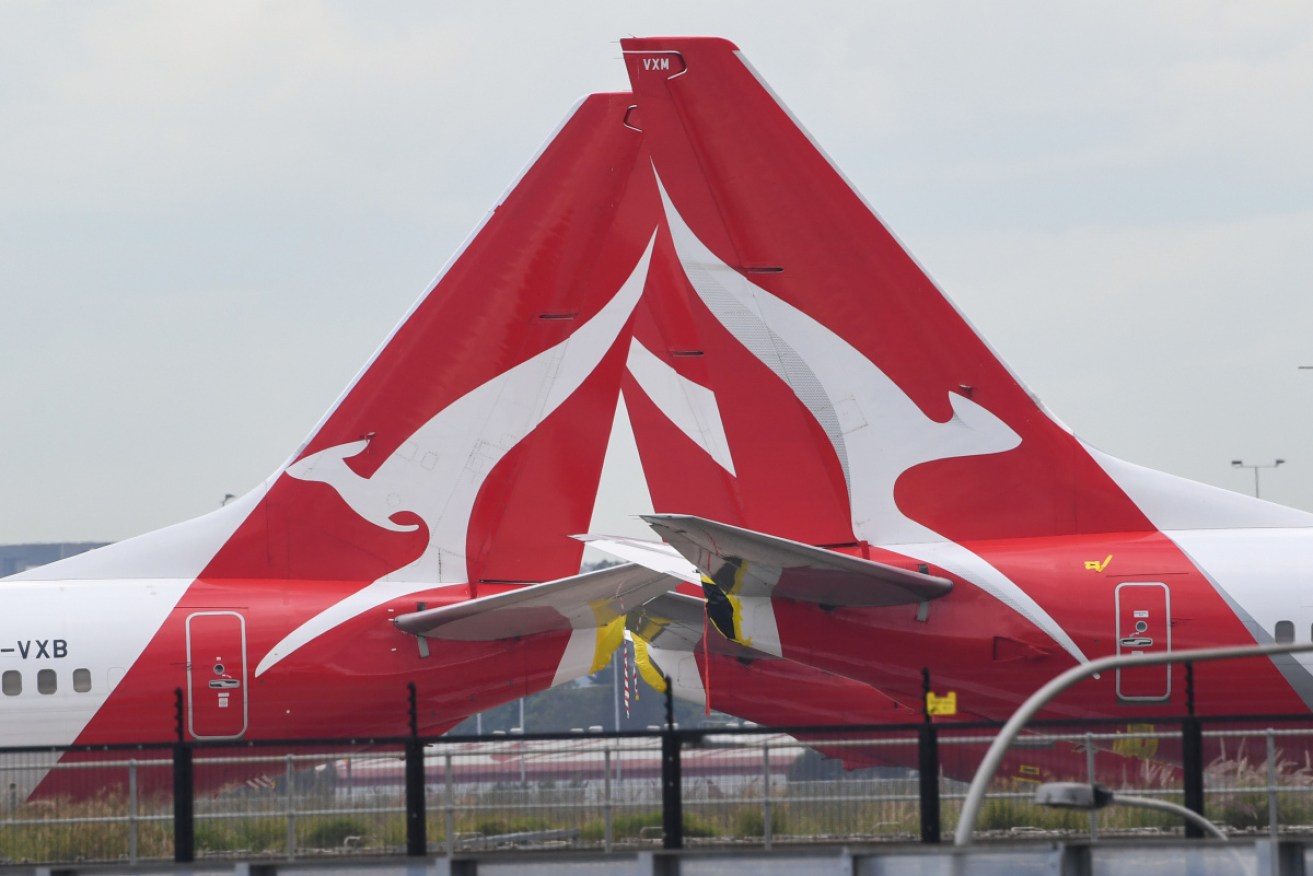 Qantas allegedly stood down a cleaner after he raised concerns about flights from China.
