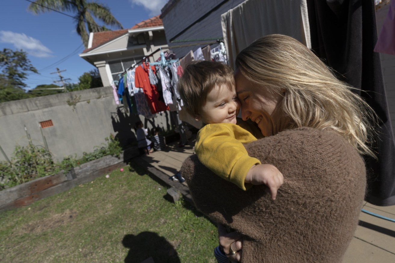 Jessica and Joe Mitchell visit a friend's house in Sydney after NSW restrictions relaxed on Friday.