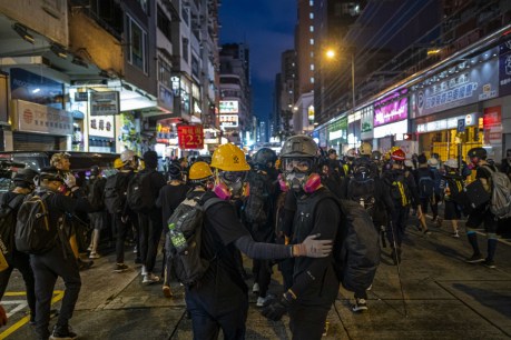 As coronavirus keeps the West at bay, China moves to tame Hong Kong