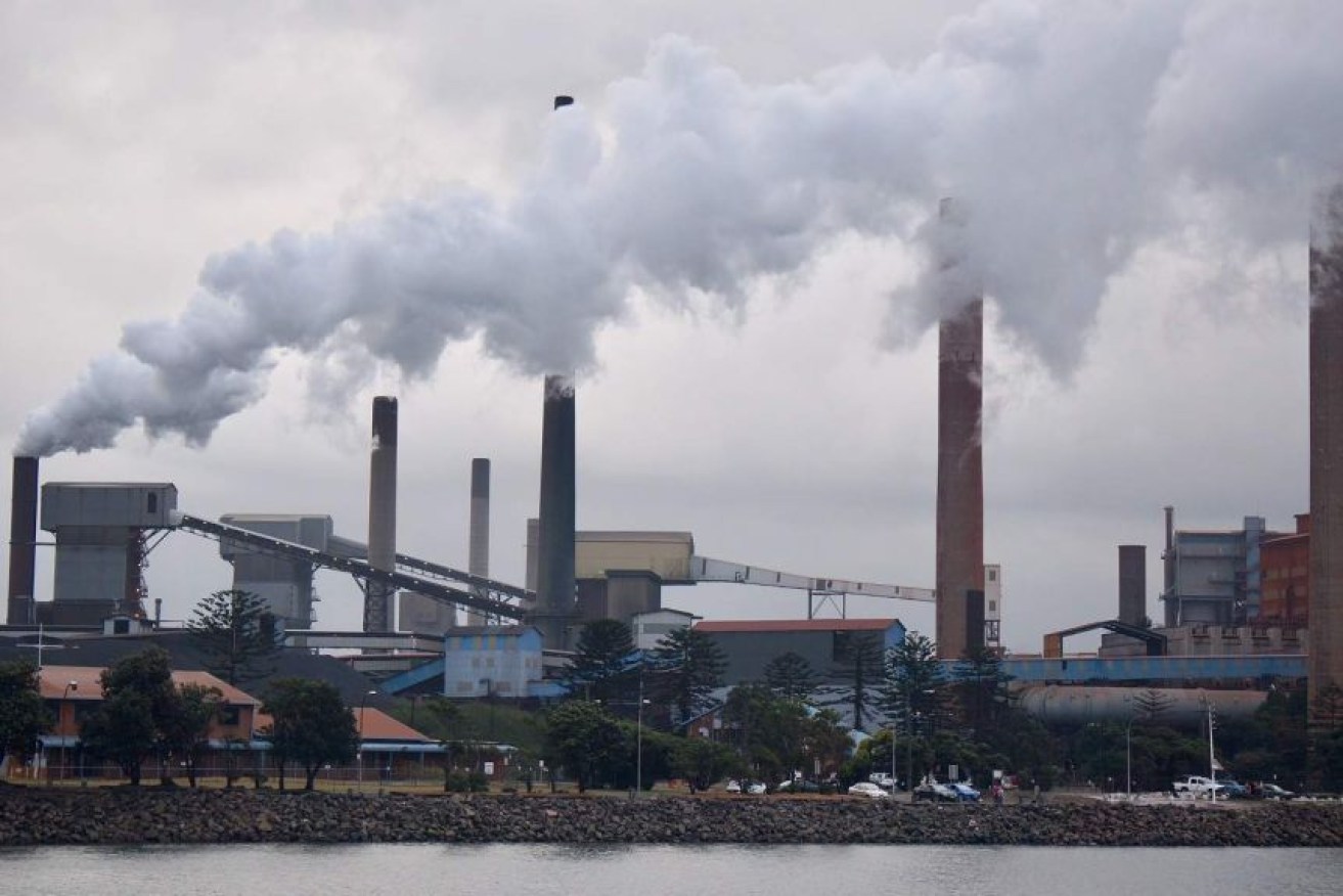 Scott Morrison says factories such as this one at Port Kembla will lead the way on emissions reduction.
