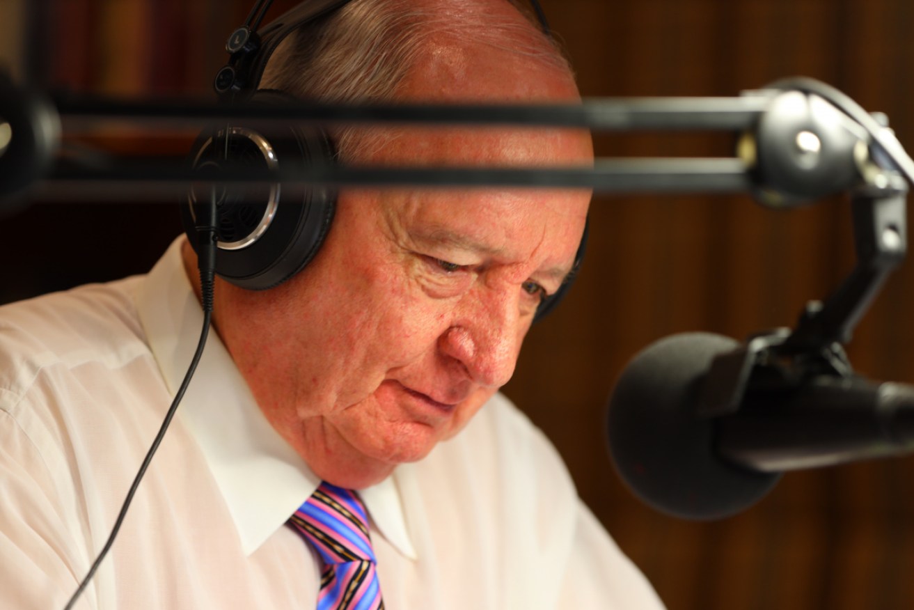 Alan Jones announces his radio retirement from his Sydney home on Tuesday. 